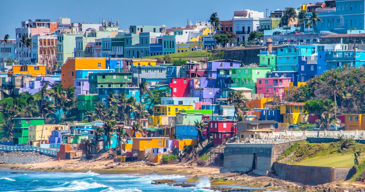 Colorful houses line the hillside over looking the beach in San Juan Puerto Rico