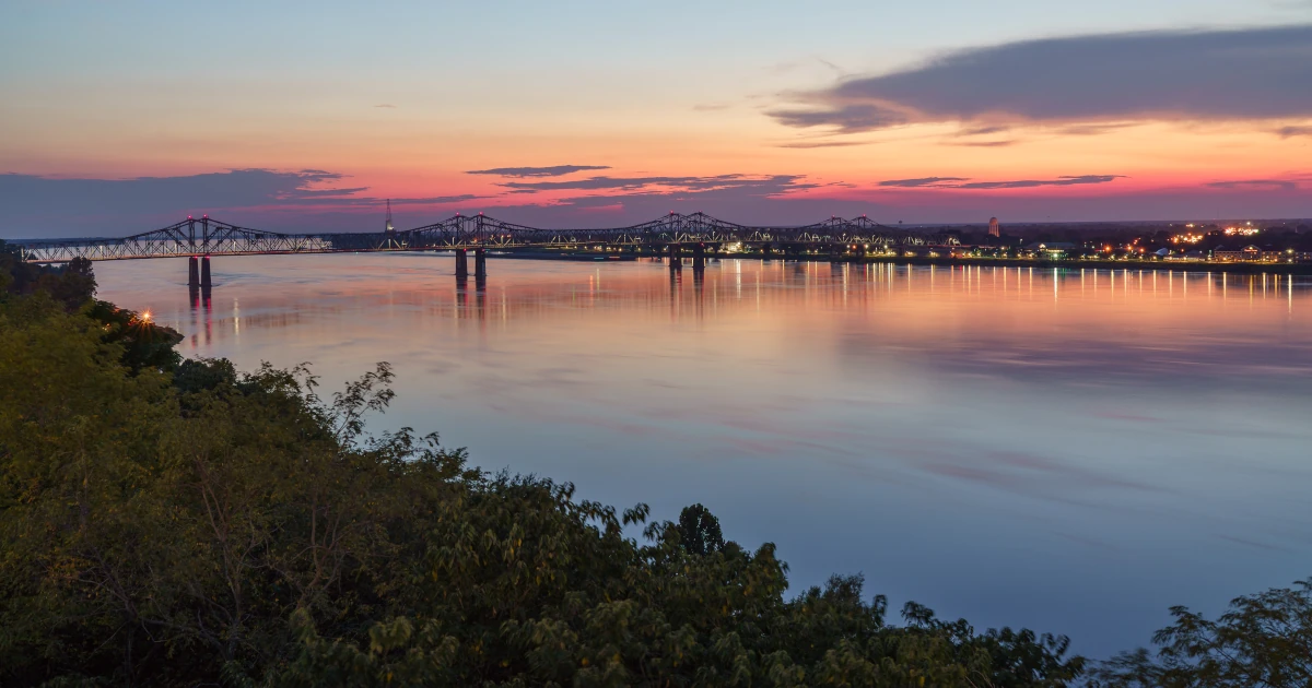 A view of the Mississippi River at sunset in Natchez, Mississippi | Swyft Filings