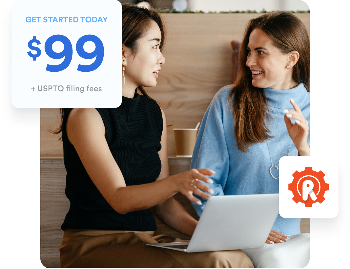 Two small business owners sitting on a bench talking