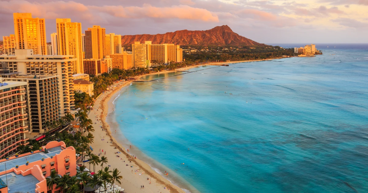 The coast of Honolulu, Hawaii at sunset | Swyft Filings