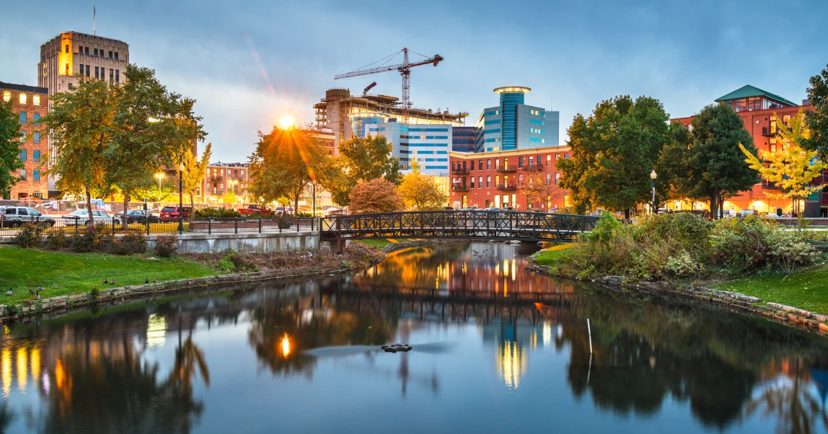 Kalamazoo, Michigan, USA downtown cityscape and park at dusk