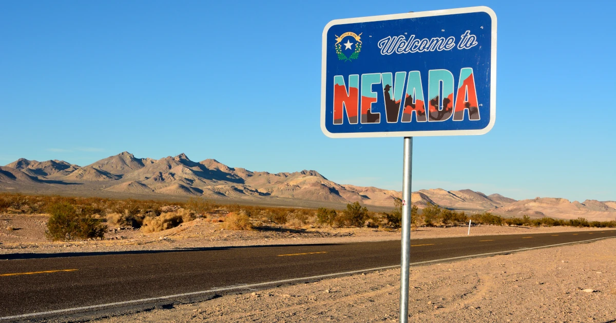 Welcome to Nevada road sign along a highway