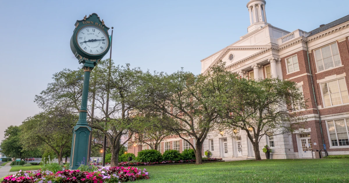Historic clock in front of a Connecticut town hall | Swyft Filings