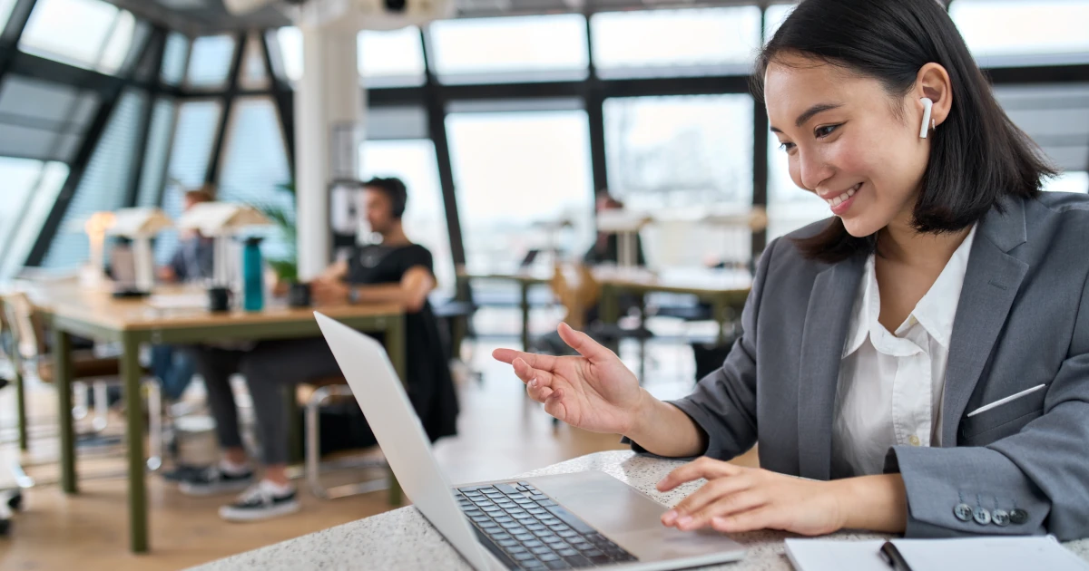 Asian business woman managing business processes using computer