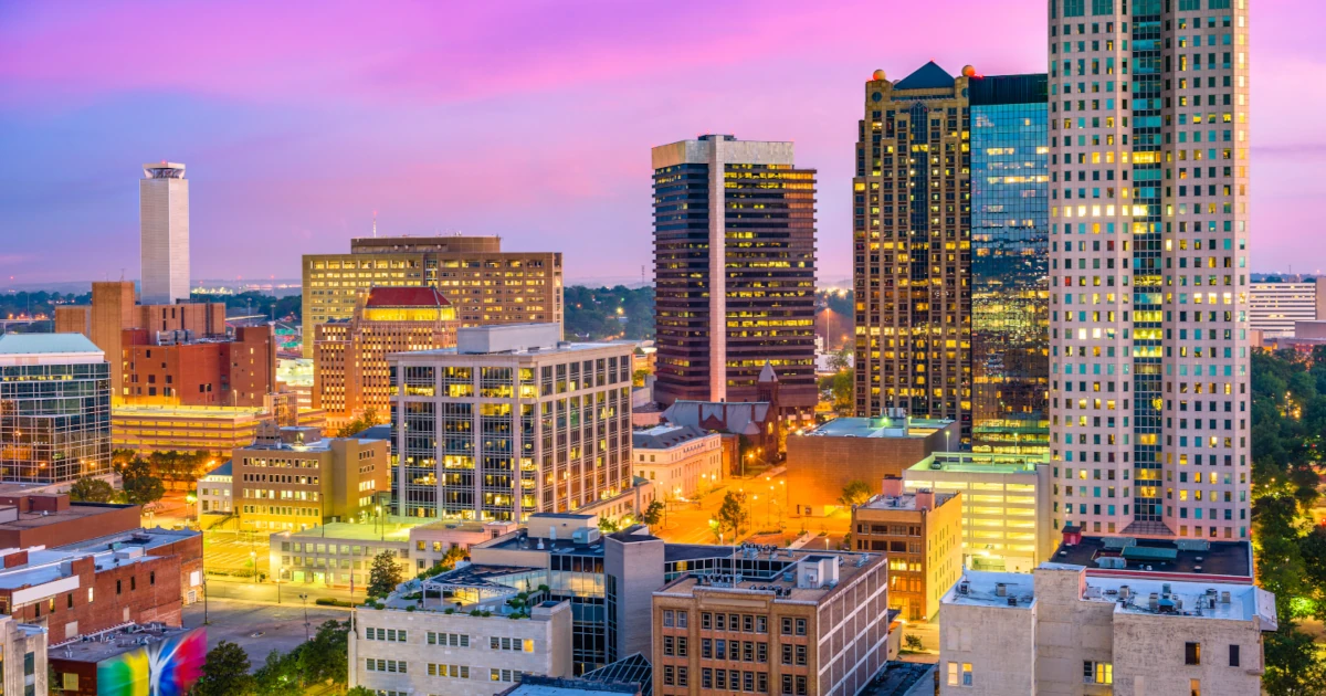 City in Alabama skyline at sunset | Swyft Filings