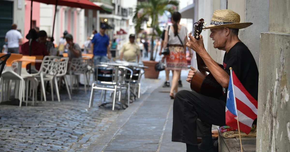 Man playing guitar on the streets of Puerto Rico