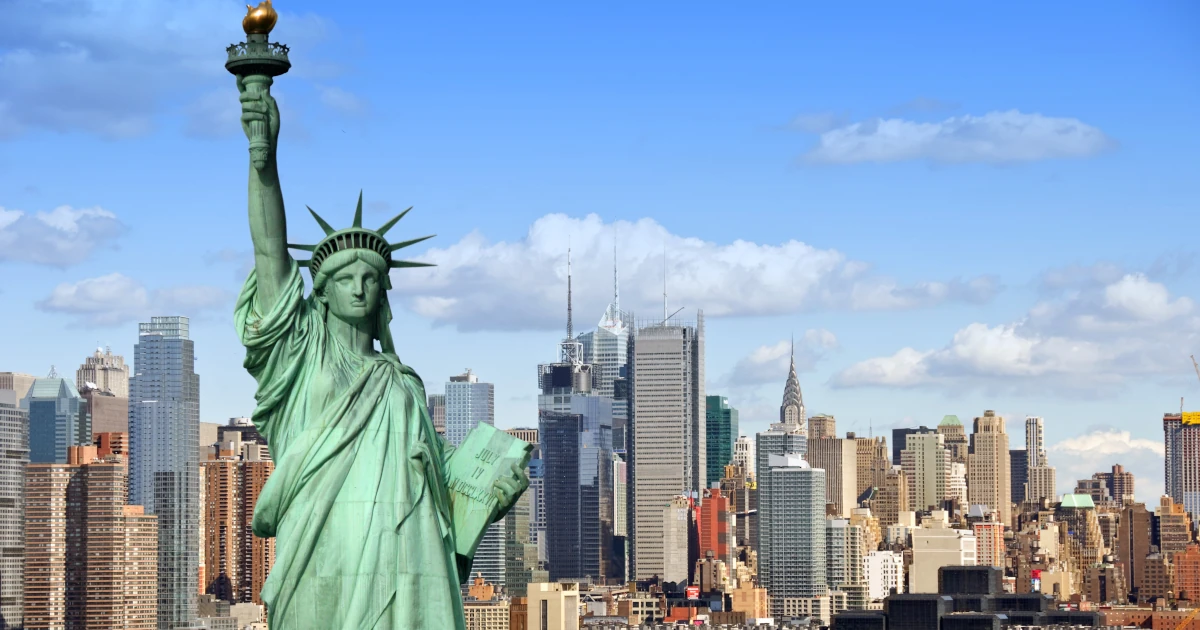 The Statue of Liberty with the New York skyline in the background | Swyft Filings