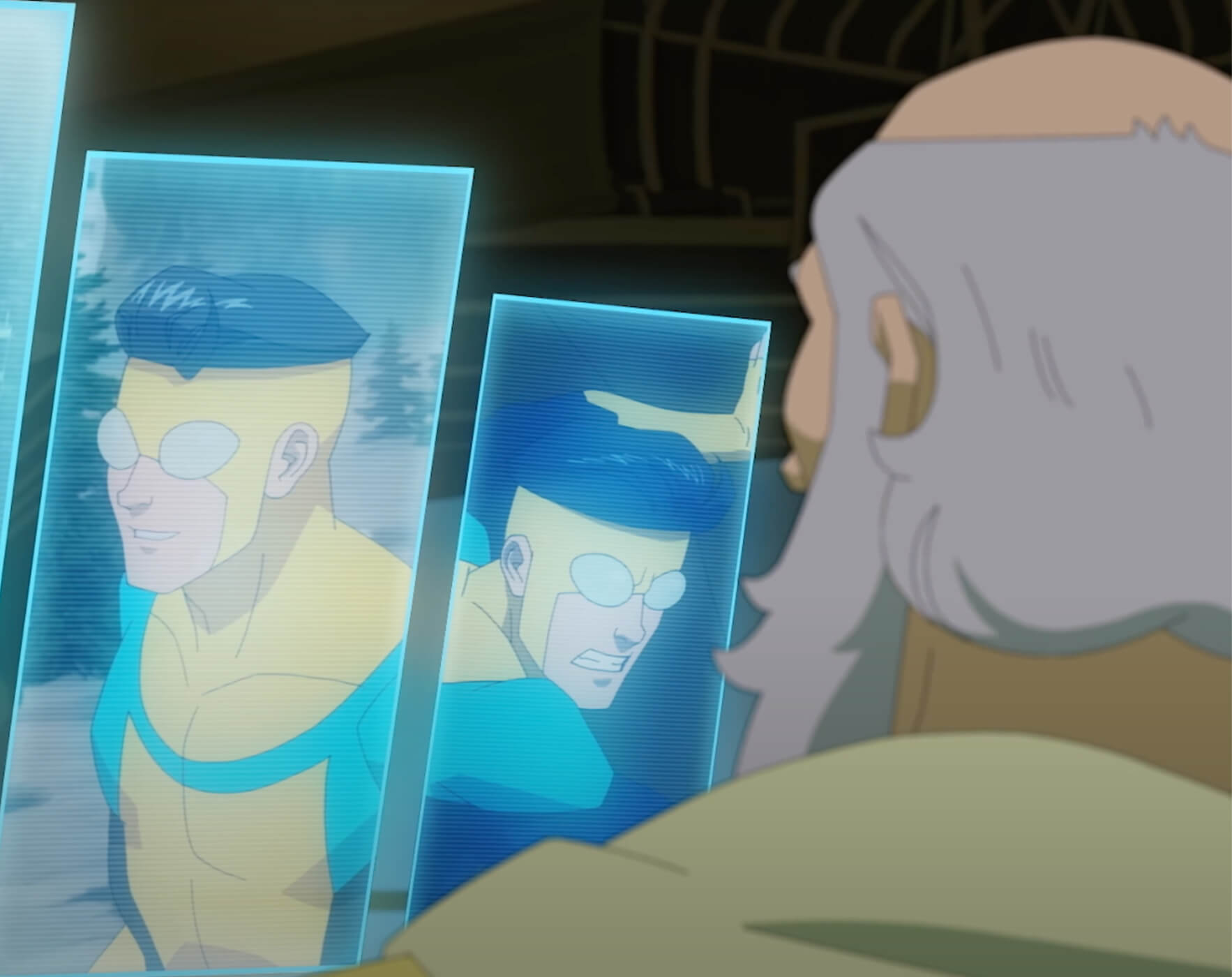 Man looking into glass showing Invincible