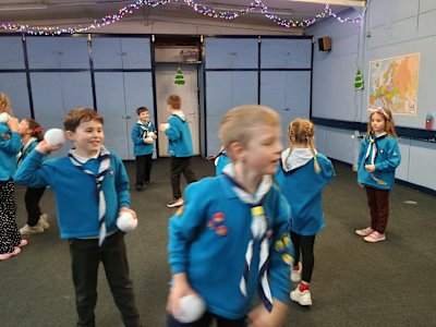 Cheeky grins on faces as the Beavers choose their next snowball target. 