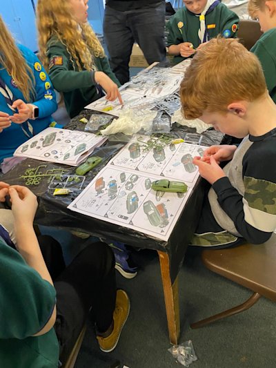 Repeat after me: don't glue your fingers together. The table of Cubs are hard at work gluing their Airfix models together and hopefully not their fingers.