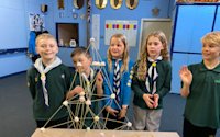 The Pouncer Cubs look proud of their tower.