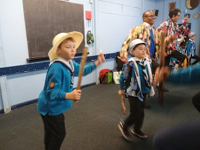 These two Beavers are trying to learn a Morris dance. There are lots of steps to learn.