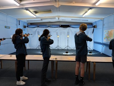 Scouts taking careful aim during their shooting competition.