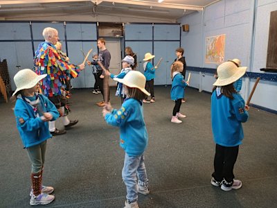 The Beavers are paired off to learn a new Morris dance.