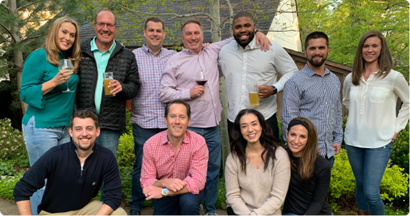 Employees at a wine tasting event