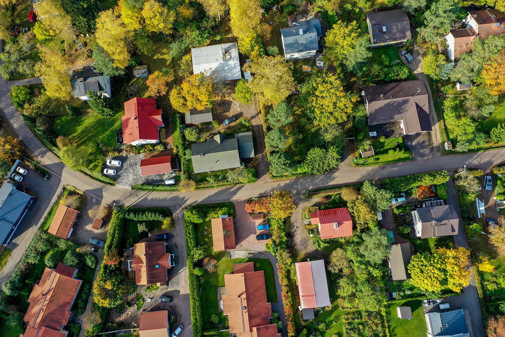 A birds-eyes view of a cluster of houses. 