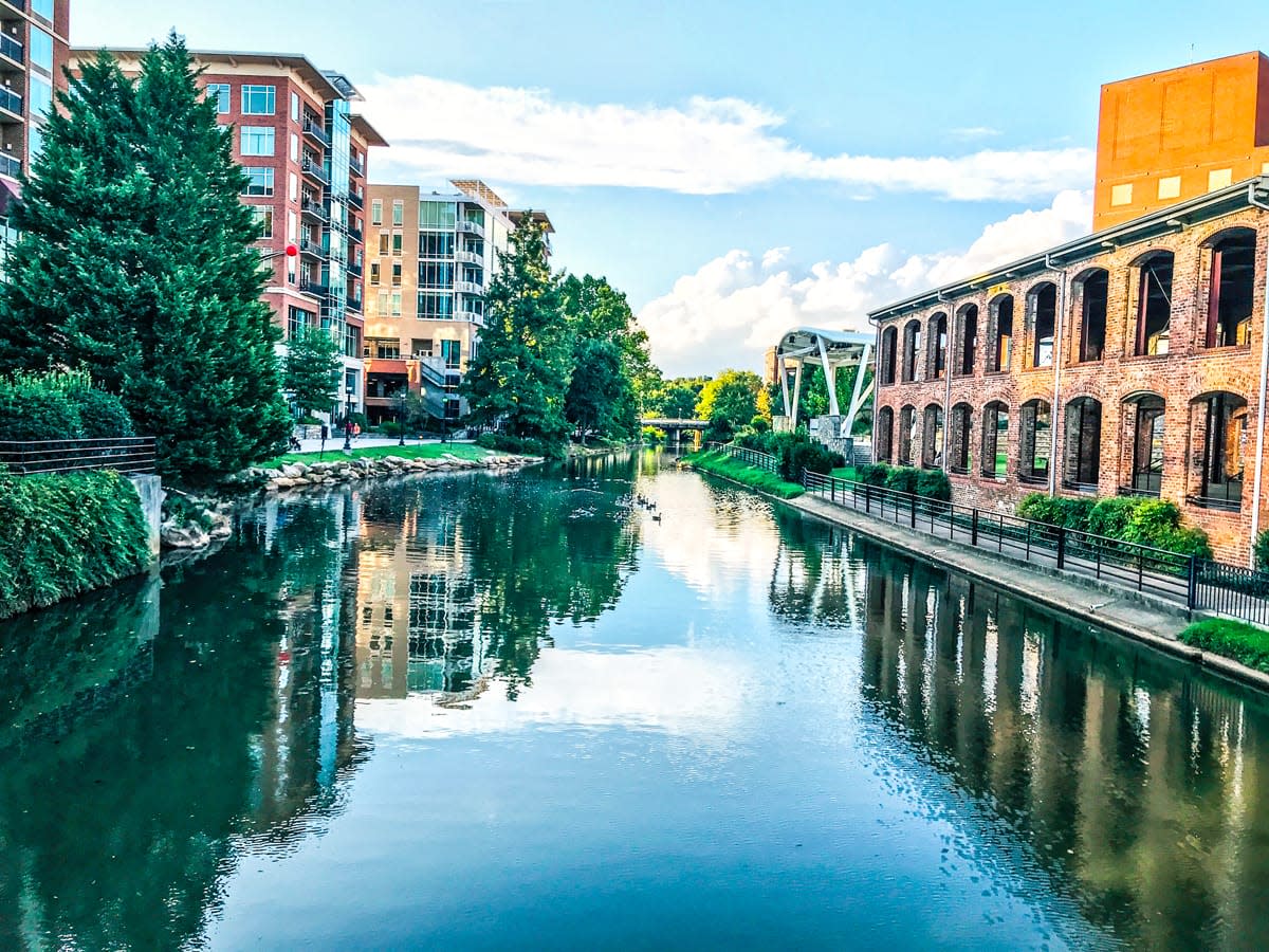 A river with buildings on each side.