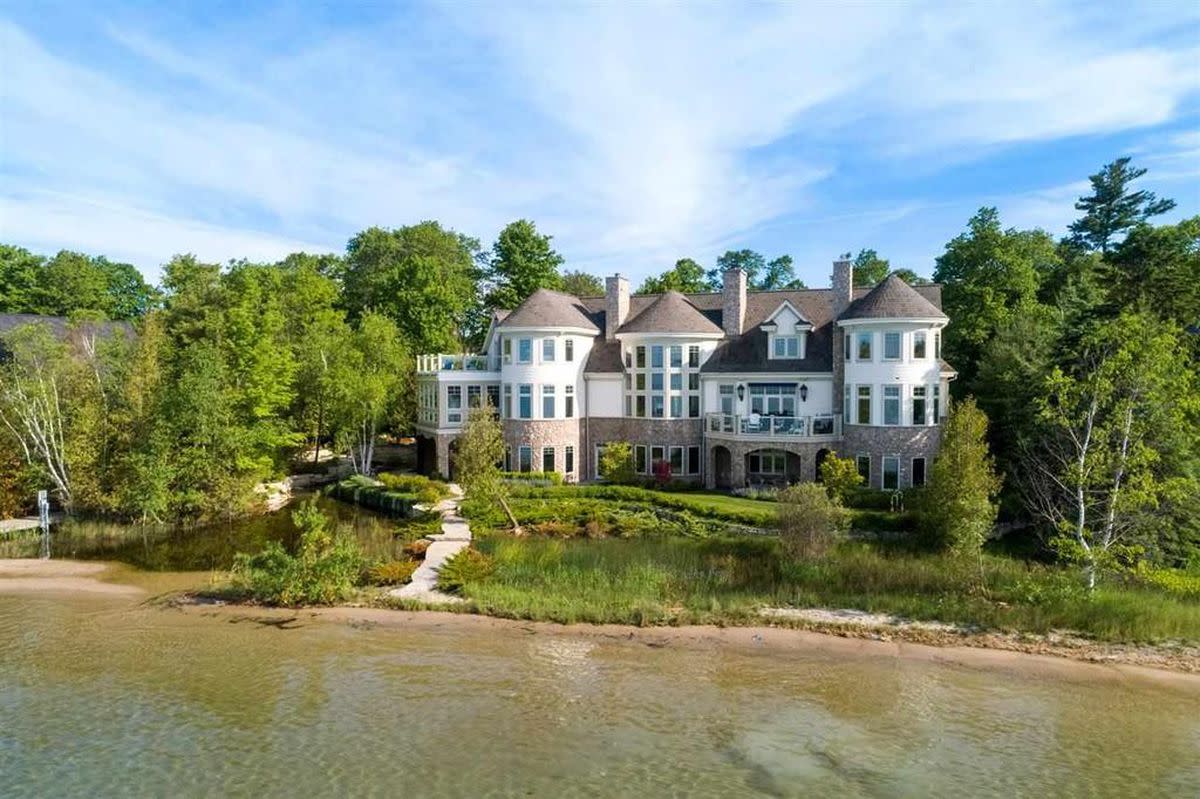 Back view of the waterfront Lake Charlevoix mansion.