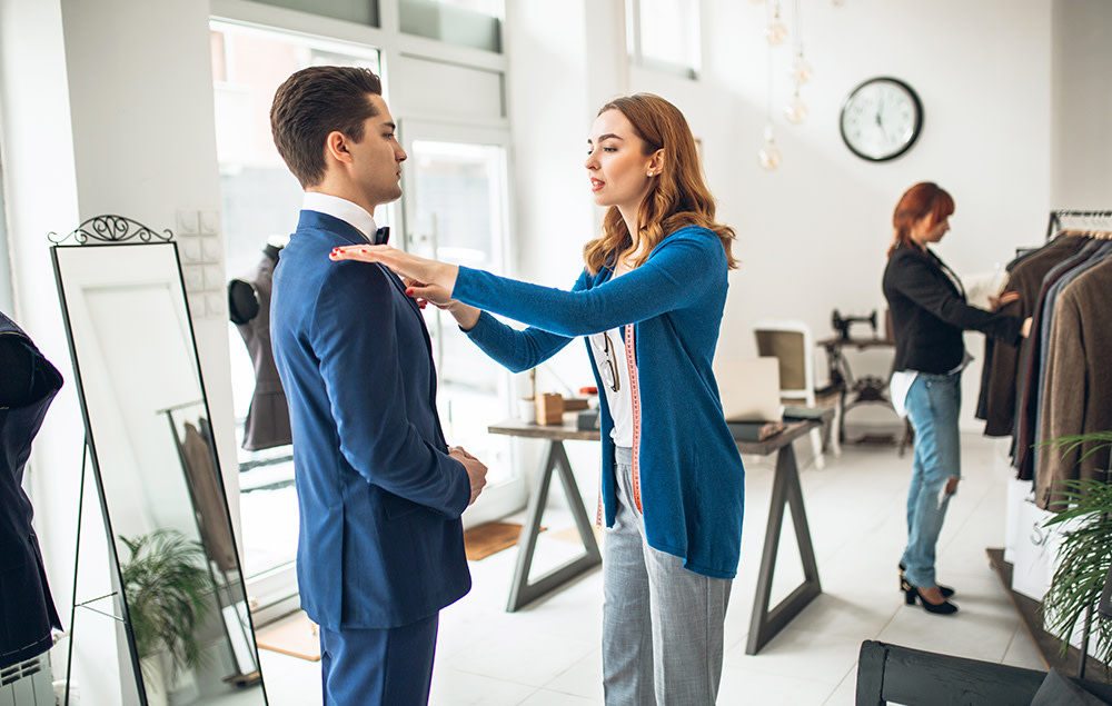 Store associate inspects customer