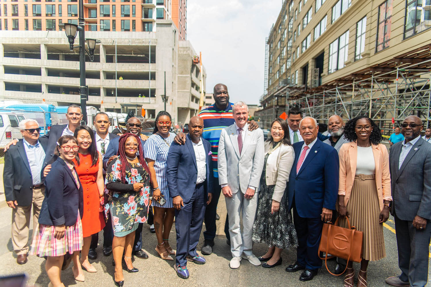 Group of individuals taking picture for project. 