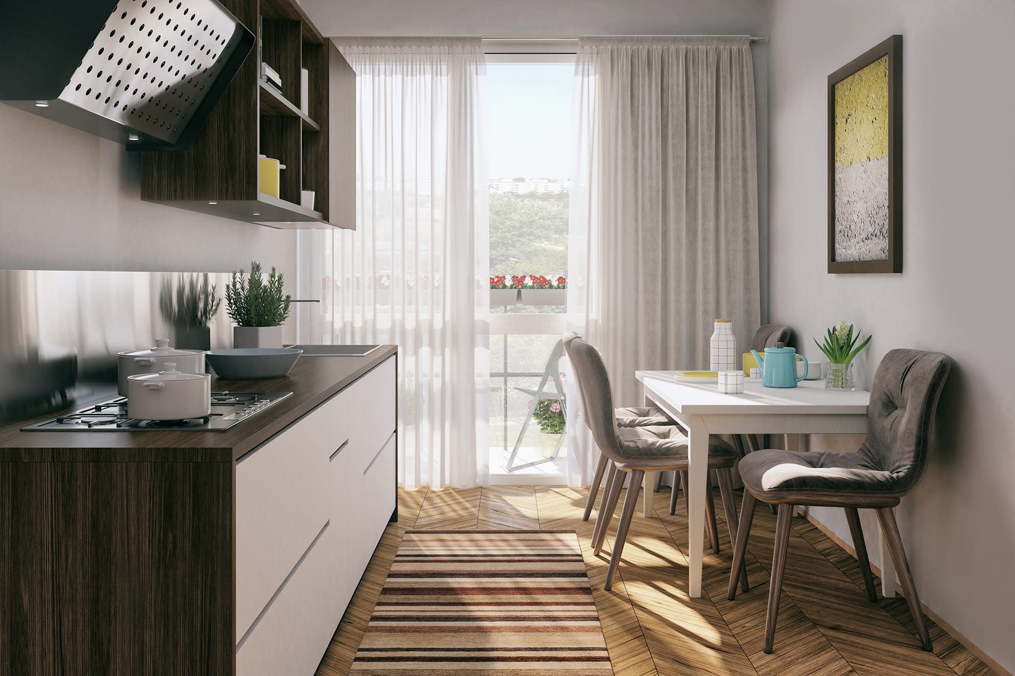 A view of the tiny home kitchen with a small table to eat at. 