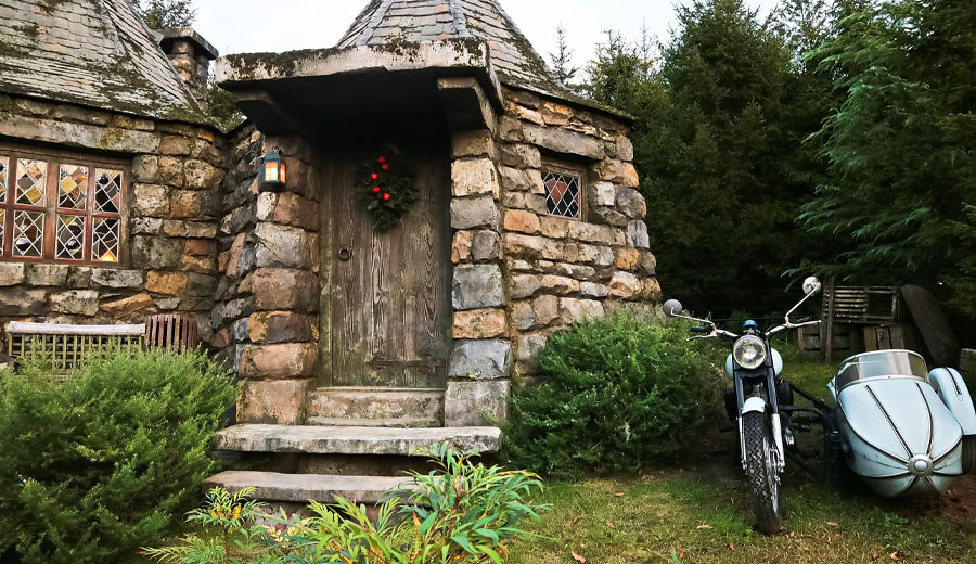 Exterior of a stone hut.