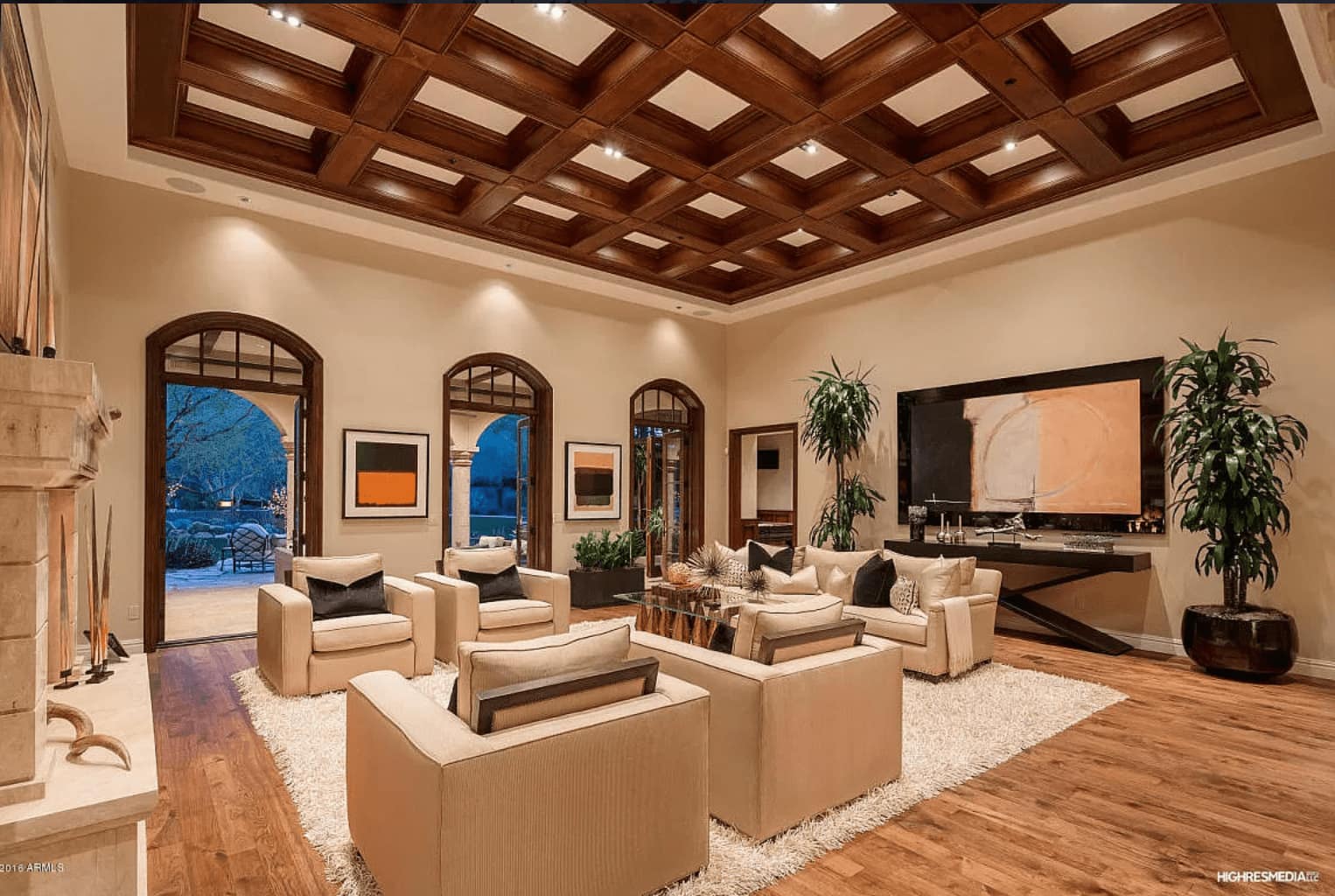 Inside look of a living room with beige furniture. 