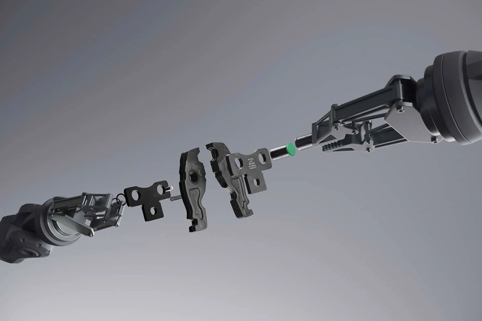 Exploded view of mechanical components showing disassembled metal parts and a green pin on a gray background.