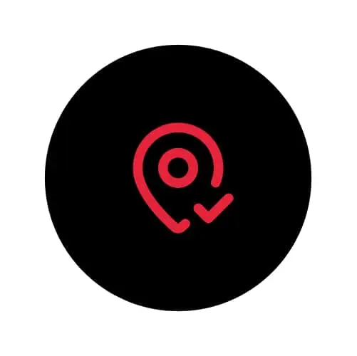 Red location pin with checkmark icon on black circular background