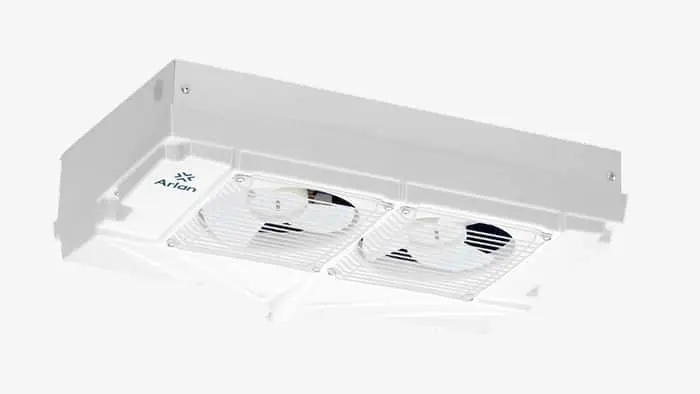 White cabinet cooler with two fans and vents on a light gray background.
