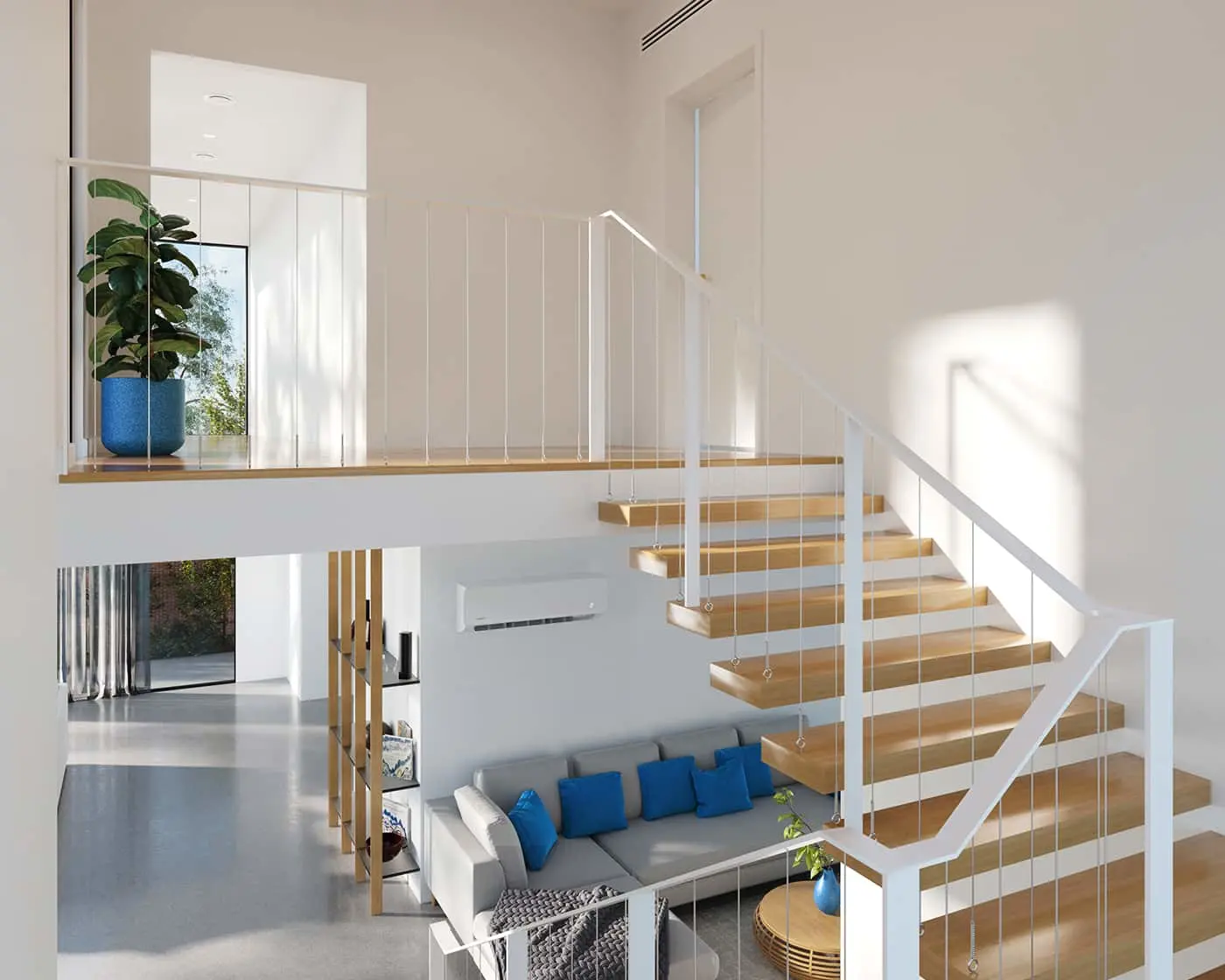 Modern two-story interior with wooden floating staircase, white railings, gray sofa with blue pillows, and plants.