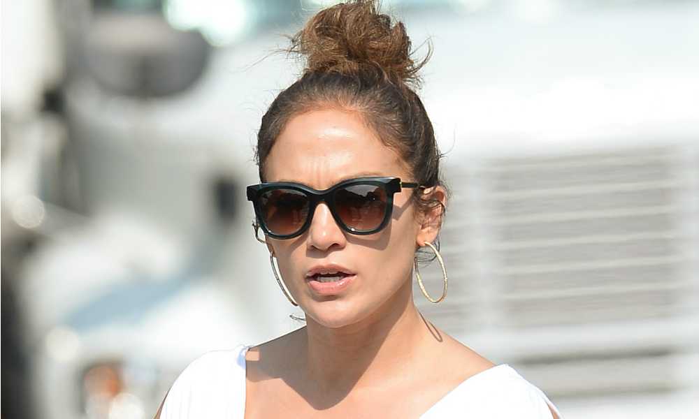 Jennifer Lopez Rocks Oversized Button-Up, Biker Shorts in NYC