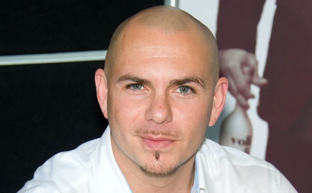 Pitbull shares 10 nuggets of wisdom about life, love & his mom (PHOTOS