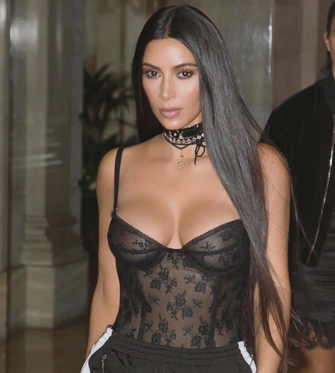 Kim must have a drawer full of sheer black bodysuits.