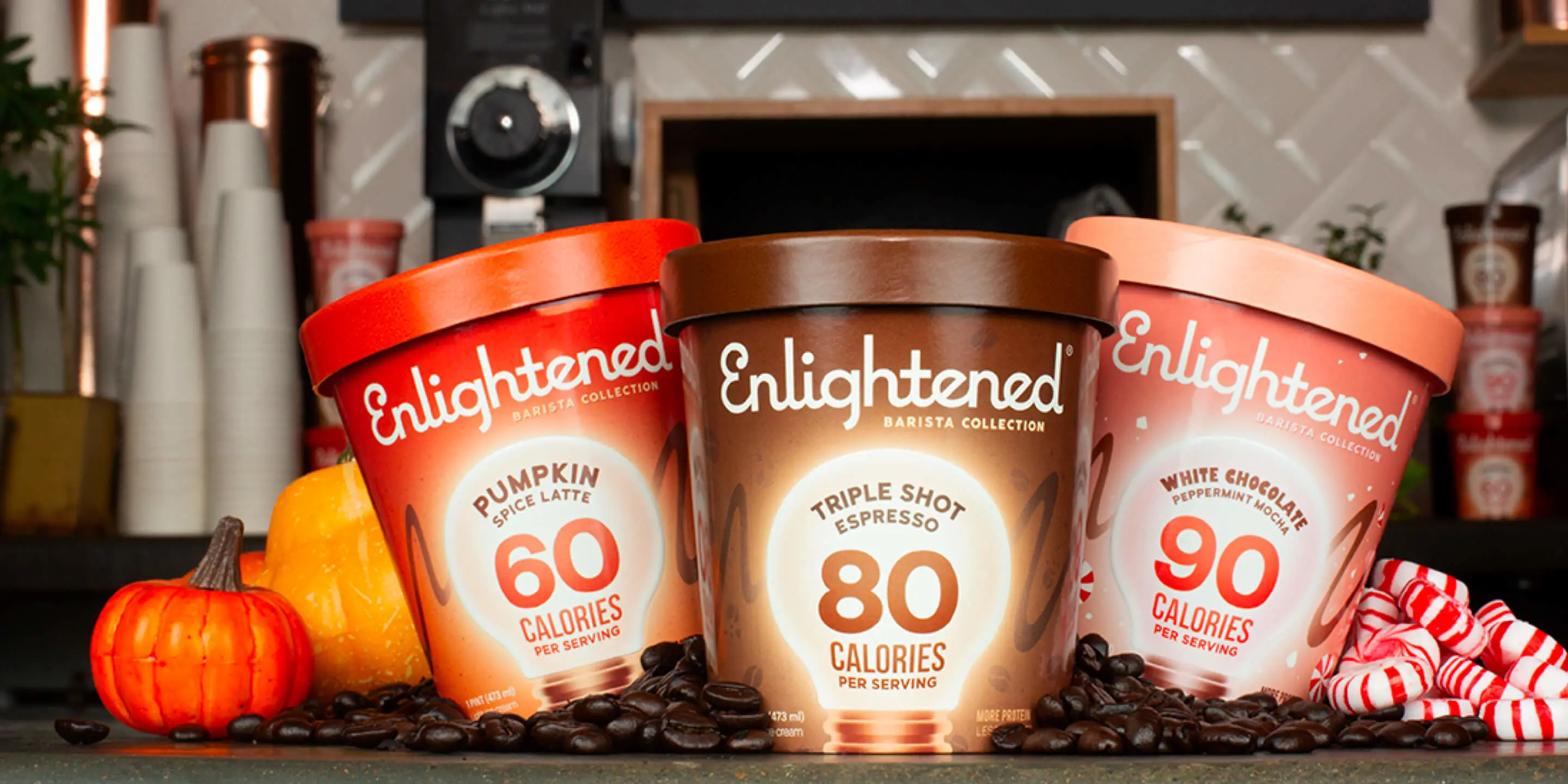 enlightened ice cream pints in coffee shop background