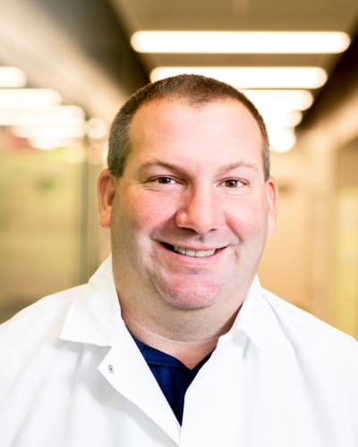 Portrait of man in lab coat