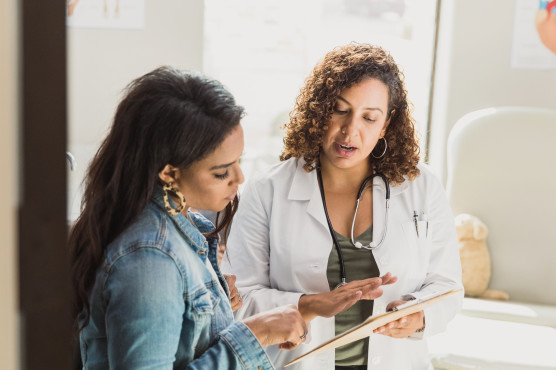 Doctor explaining a patient