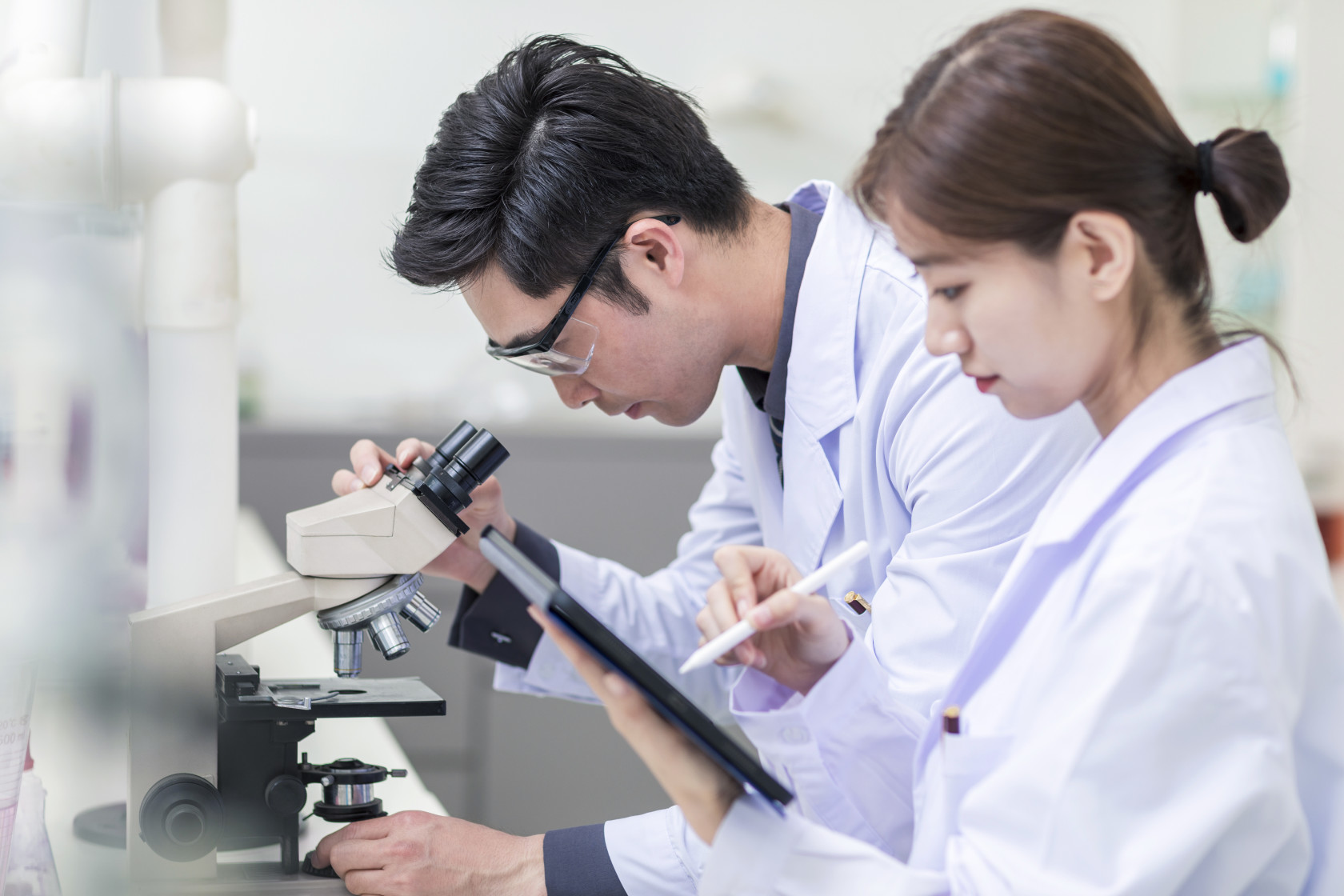 Female scientist working with test tubes in a lab