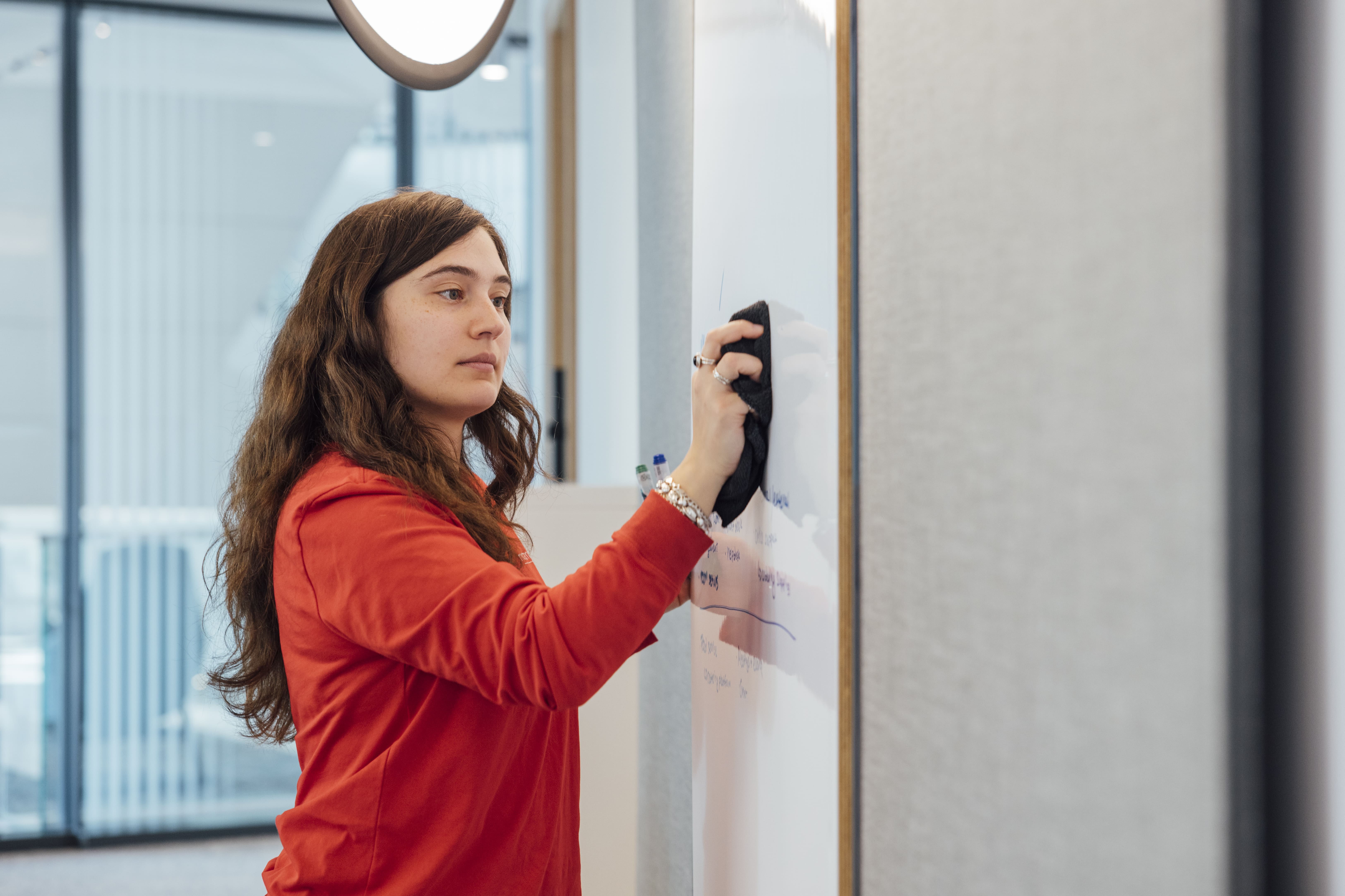 Woman at a whiteboard