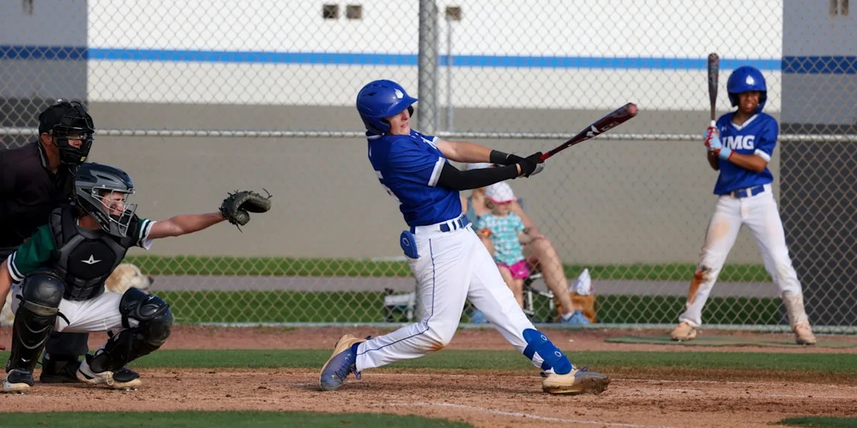 IMG Academy baseball play follows through on a swing