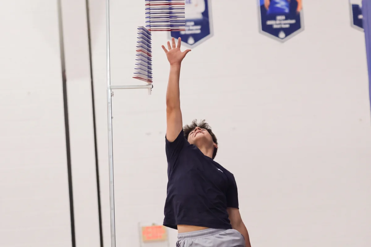 Male practicing vertical jumps