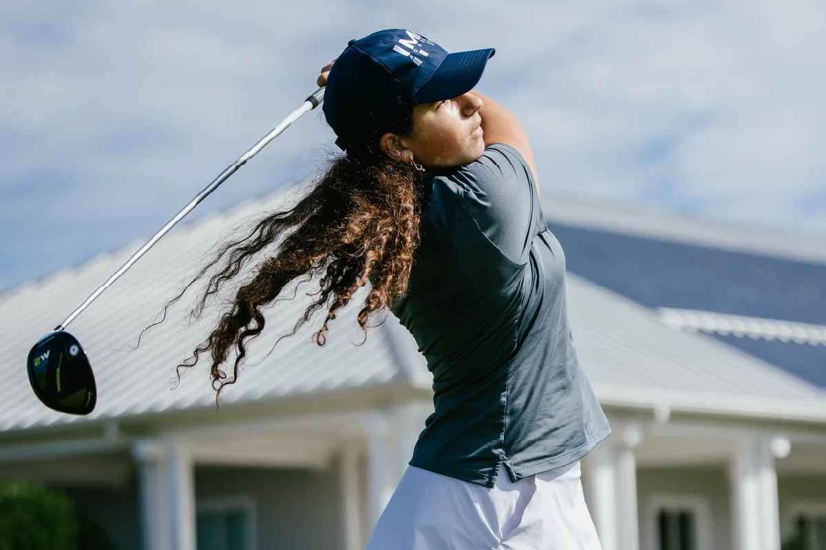 IMG Academy student-athlete follows through on a golf swing