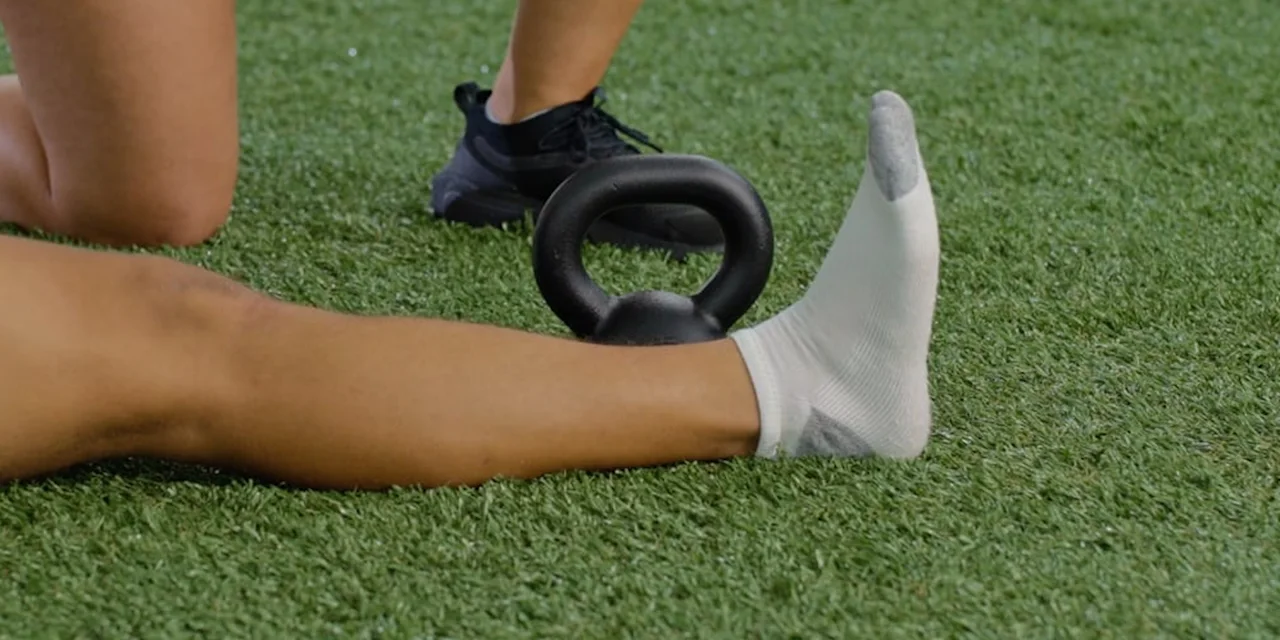 Hip Flexor Exercise: Leg Lift Over Kettlebell