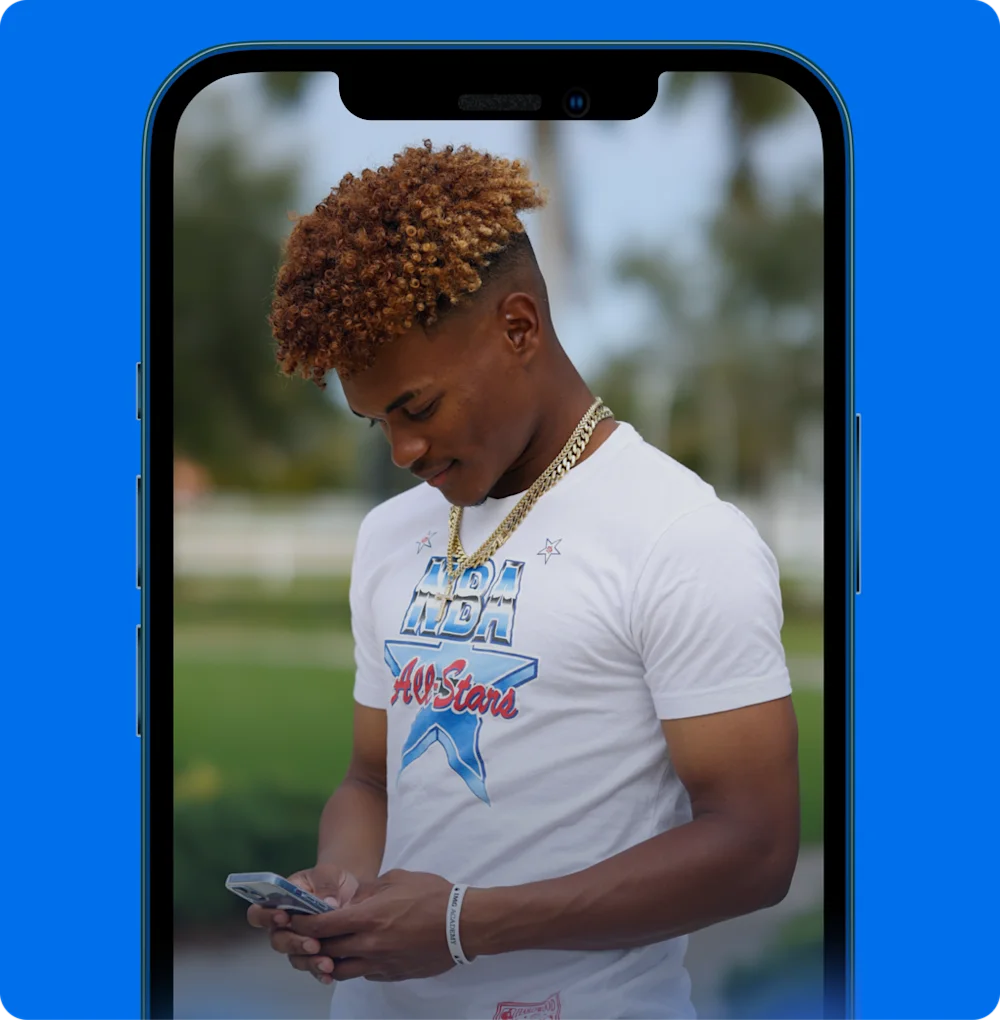A photo of an athlete actively using the IMG Academy coach mobile app.