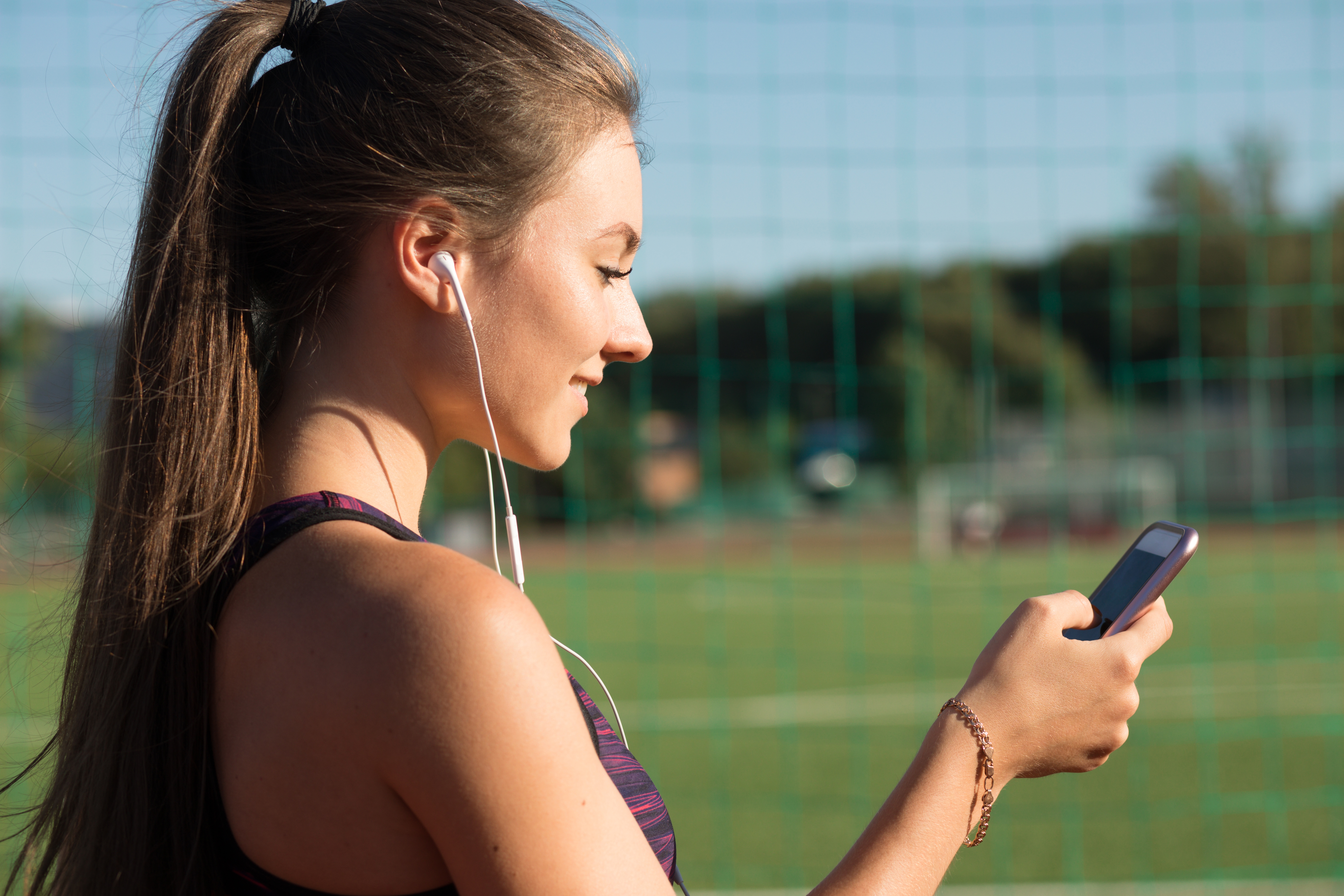 Girl on phone checking social media