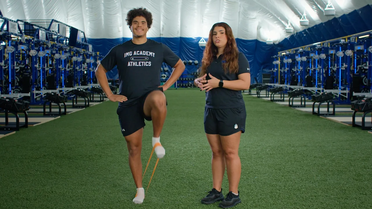 Corrective Exercise: Standing Hip Flexor with Band