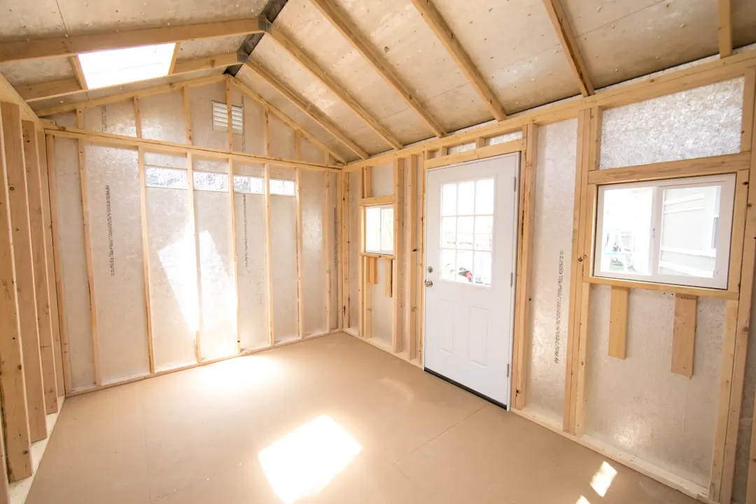 interior of a shed with no wall sheathing