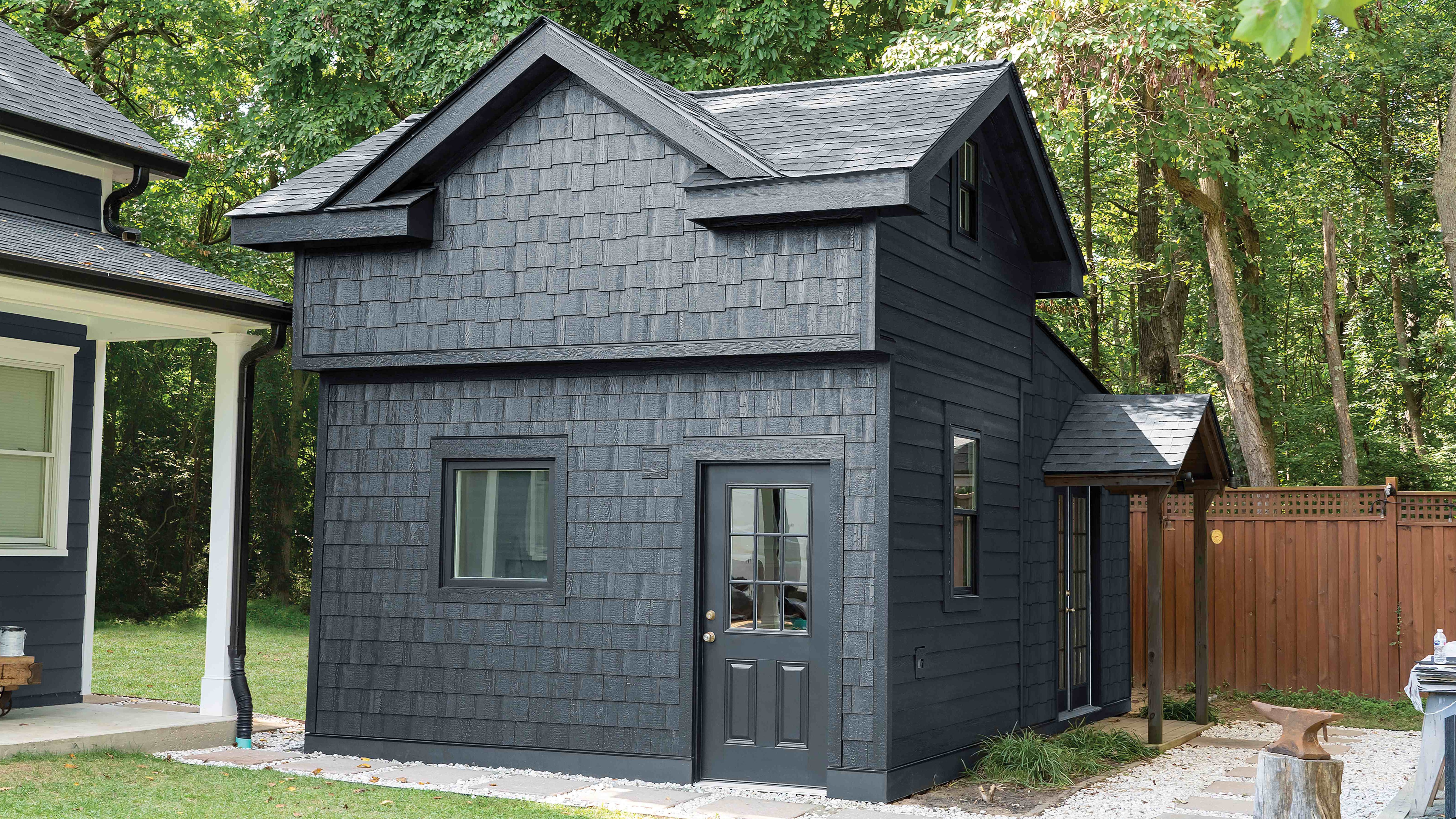 black house with cedar texture shake lap siding