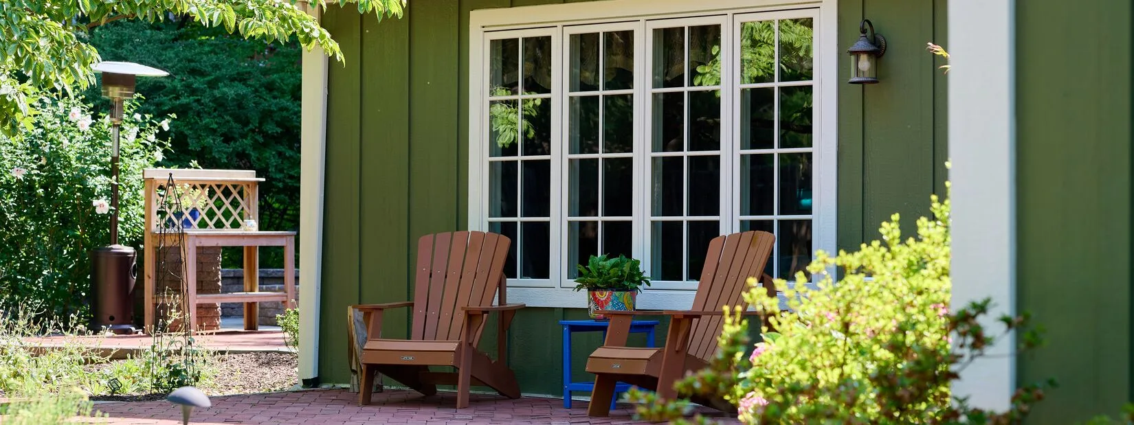 a home with gray and white vertical siding