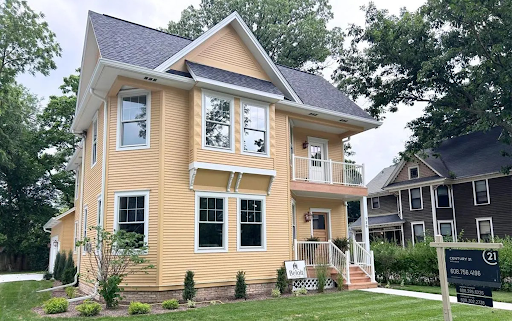 yellow two story house in beloit
